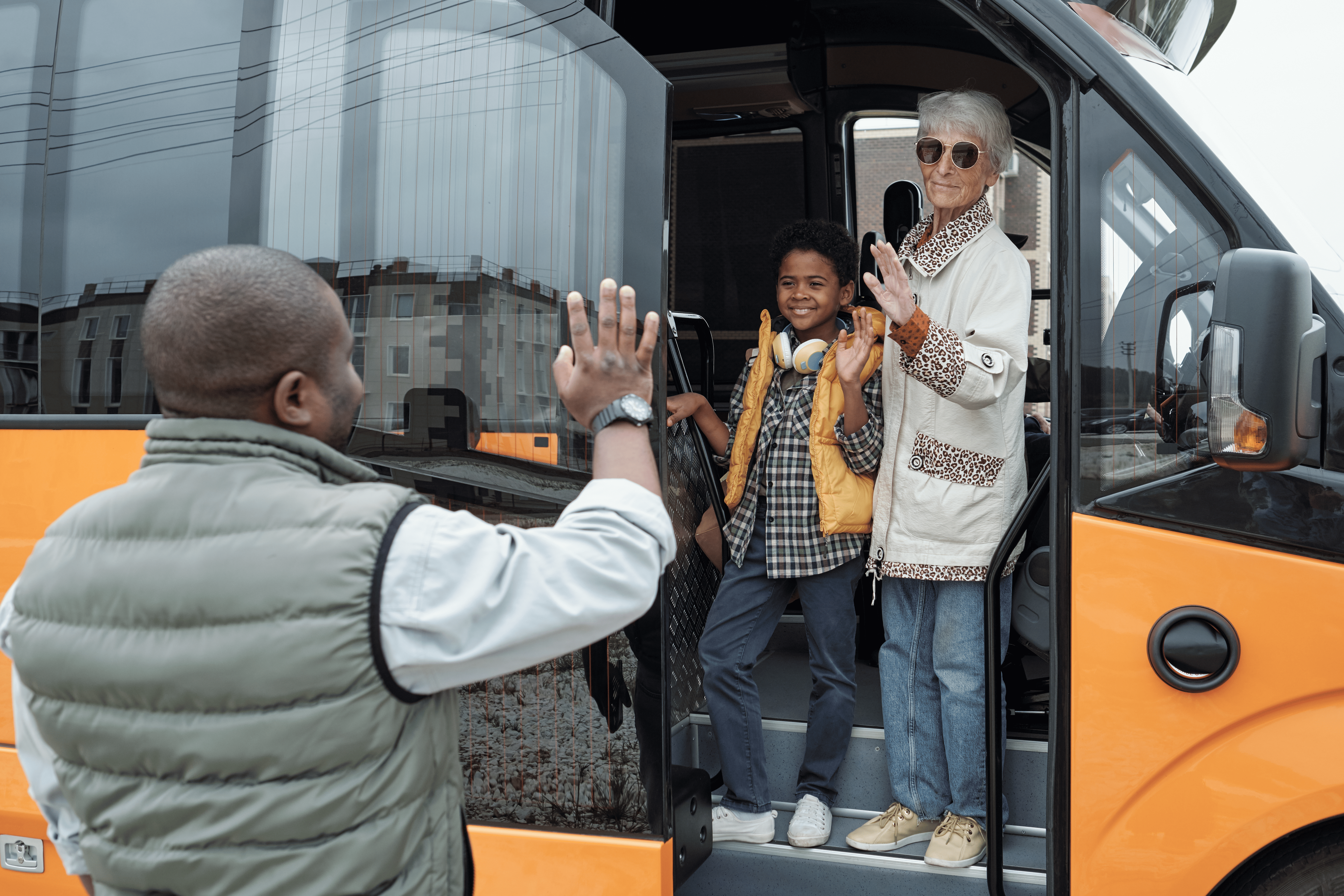 Students boarding a minibus near Amager for an educational trip